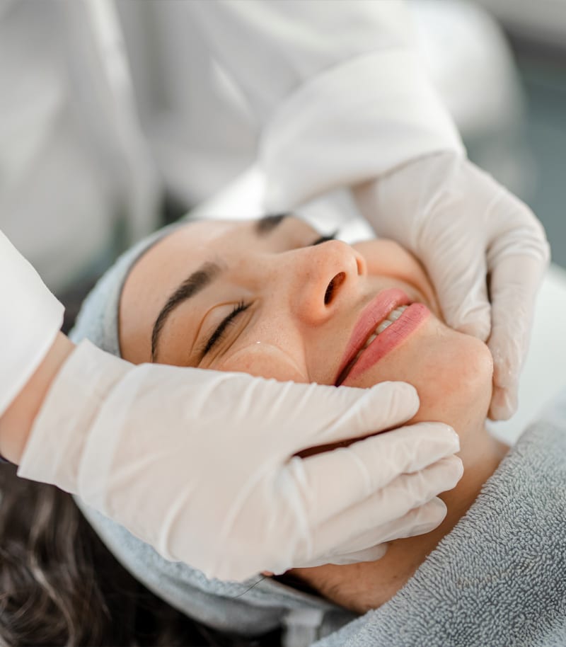 a person lying on a bed